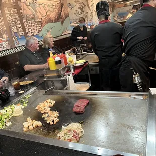 a large grill with food on it