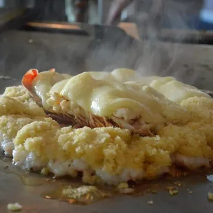 a ring of our shrimp (half golden sauce, half garlic) plus golden lobster in the middle