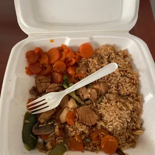 a fork in a styrofoam container
