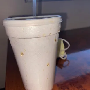 The drink they gave us, all over our cup