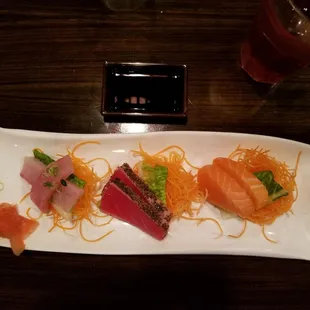 Yellow Tail, Black Peppered Tuna and Salmon sashimi. The best!!