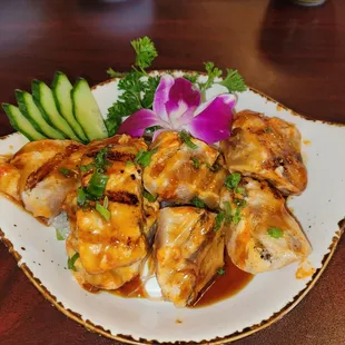 First time visitor. BBQ tuna. This place is legitimate. Owner makes the sushi. Service is excellent. Everything we ordered was really good.