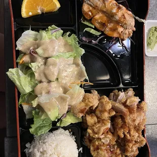 Salmon teriyaki and sesame chicken bento