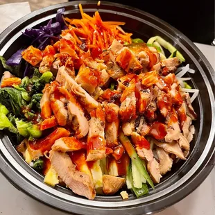 a bowl of chicken and vegetables