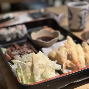 a bento box of food