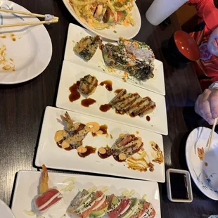 5 rolls because we love it so much.  Blooming onion roll, 911, crunchy roll, tailspin and Jessica roll.