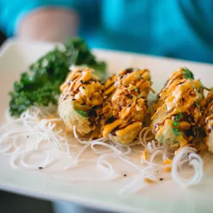 a person holding a plate of food