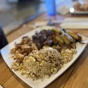 Steak and Chicken with fried rice and veggies