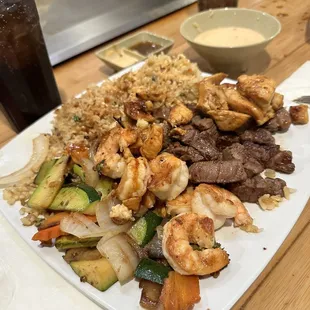 Shrimp, Chicken and Steak with Garlic Rice and Veggies