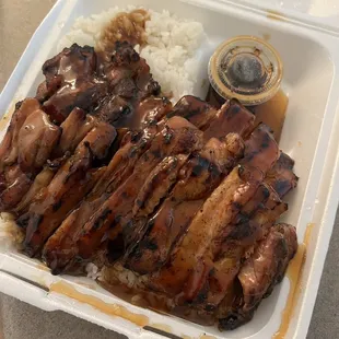 a meal in a styrofoam container