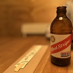 a bottle of beer on a table