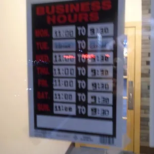 Hours of operation, front entry door.