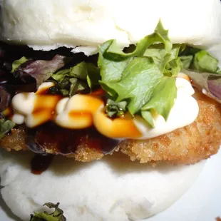 Fried chicken bun, close-up.