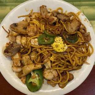 Over cooked burnt lomein noodles etc. NOT Spicy at all!  Cook looked like it was a bother to cook my food....