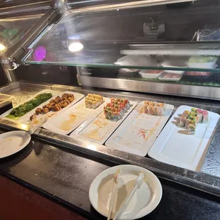 Sushi chef should move stuff to front.  Sushi was old and had been there for a while.