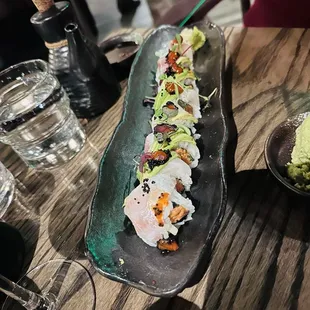 a sushi dish on a long platter