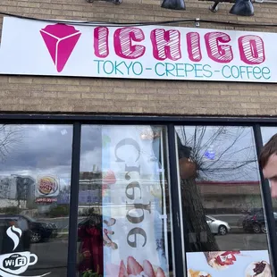 a man standing in front of a store