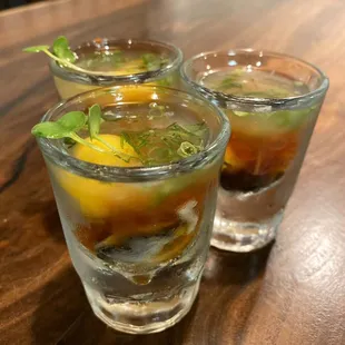 Oyster special shot in cold sake with uni, ikura &amp; quail eggs.