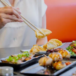 a woman eating sushi