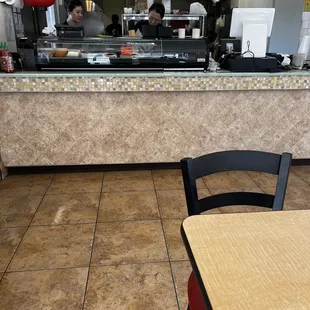 a view of a restaurant kitchen
