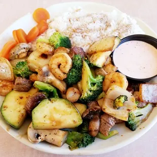 Hibachi Steak &amp; Shrimp with Stir Fried Vegetables and Steamed Rice.