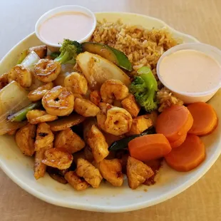 Hibachi Chicken &amp; Shrimp with fried rice and their delectable shrimp sauce.