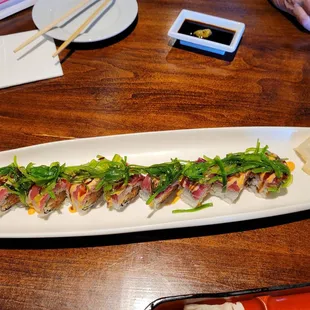 Nori topped individual roll called Hawaii Roll