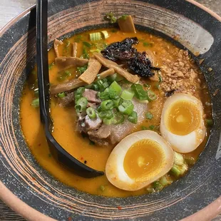 a close up of a bowl of ramen