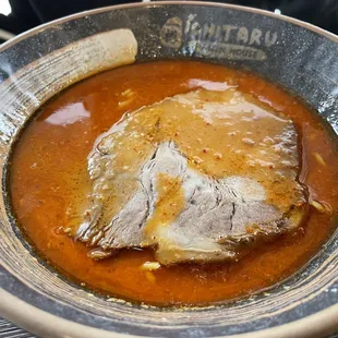 a close up of a bowl of ramen