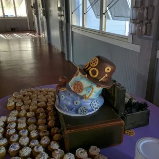 The leaning tower of wedding cake. $1000 cake with no structural support. Clearly this was worth every penny.