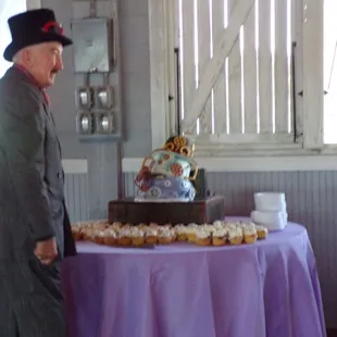 $1000 wedding cake leaning over.