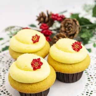 three cupcakes on a doily