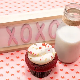 a bottle of milk and a cupcake