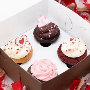 three cupcakes in a box