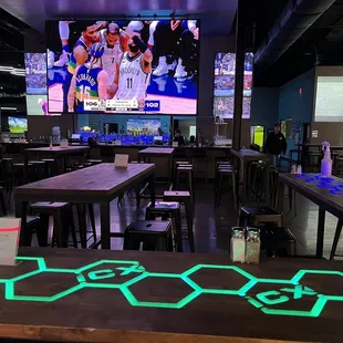 a sports bar with neon lights