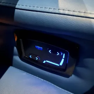 Buttons on reclining seat