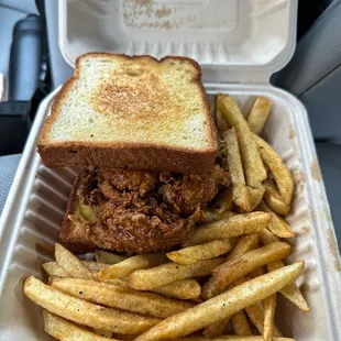 Hot Maple Blue Oyster sandwich with fries