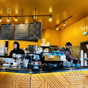 two people working at the counter