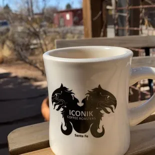 a cup of coffee on a table