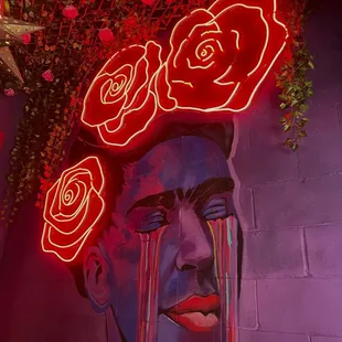 a woman with roses on her head
