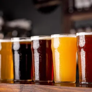 a row of beer glasses