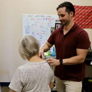 chiropractor performing IASTM