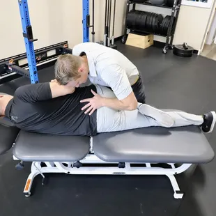 chiropractor performing chiropractic adjustment