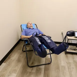 patient in normatec recovery boots