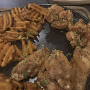 Wings and fries appetizer.