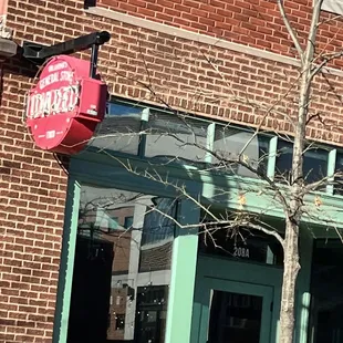 the front of a brick building
