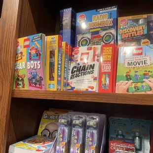 a bookshelf full of children&apos;s toys