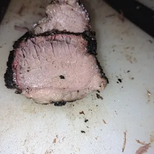 a piece of meat on a cutting board