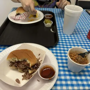 Me and my friend eating their Texas Brisket. He has Broccoli and cheese on the side, while I have baked beans (they were pretty good).