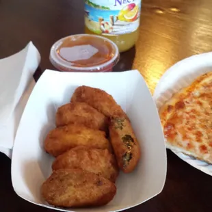 Ideal's jalapeño poppers with a slice of cheese pizza
